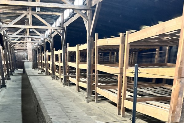 Prisoner bunk beds in barracks at the Auschwitz-Birkenau Memorial and Museum.
